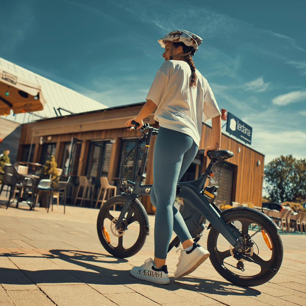 Customer Gregory is riding a DYU electric bicycle.