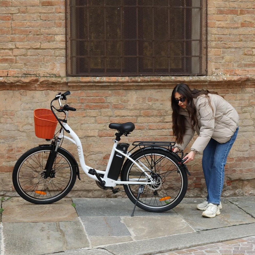 Jean-Didier is riding a DYU electric bicycle to commute.