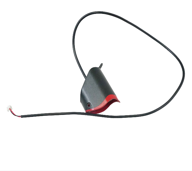 Sleek electric bike headlight with red trim and connectors for quick installation. Sleek electric bike headlight with red trim and connectors for quick installation.