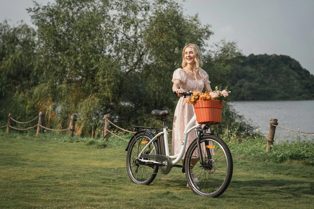 DYU C6 city e-bike with front basket near water for UK grocery rides