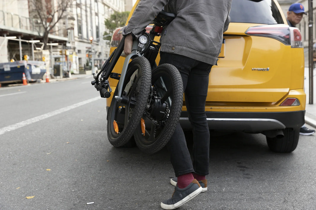 DYU T1 folding e-bike carried on a UK-style street for EAPC rules guide